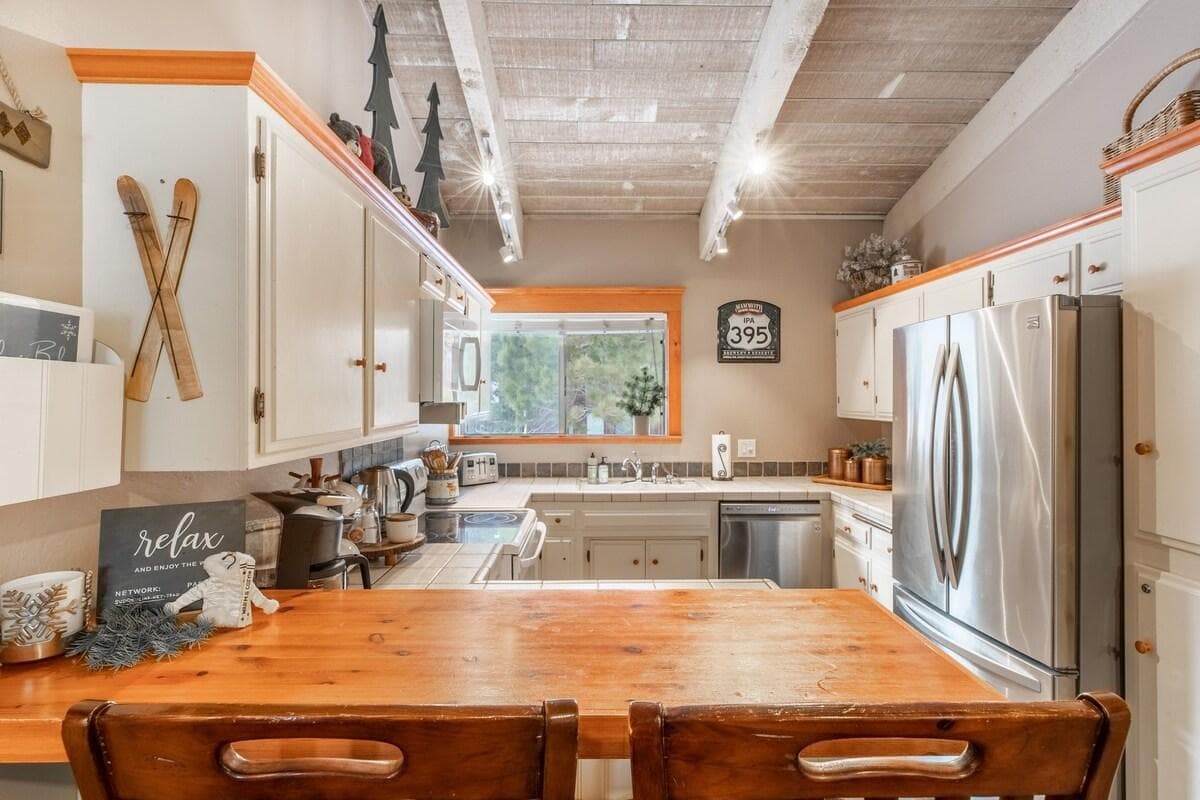 Belly up to the bar and enjoy the kitchen window view.